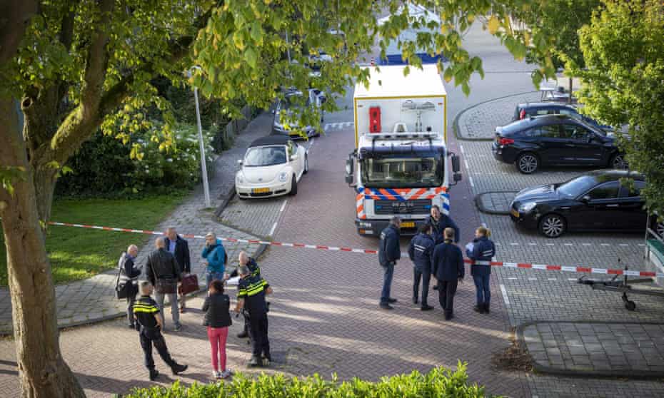 Police at the scene in the Buitenveldert suburb of Amsterdam after the lawyer Derk Wiersum was shot dead