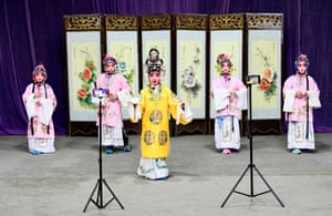 Hohhot, China: a livestream is broadcast on mobile phones as children perform to welcome the upcoming Chinese new year