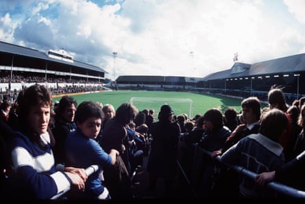 Tottenham fans photographed behind a goal, looking towards the White Hart Lane pitch, during the 1976-77 season