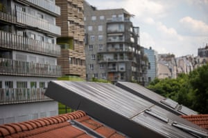 Solar panels alongside high rises