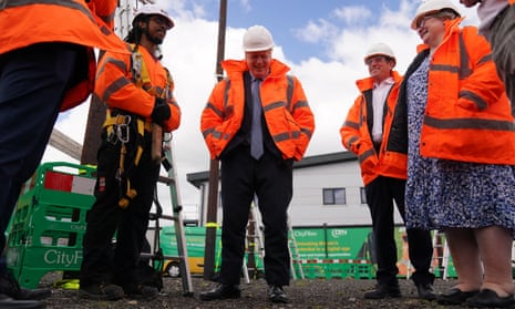 Boris Johnson with work and pensions secretary Therese Coffey visiting a training academy in Stockton-on-Tees. 