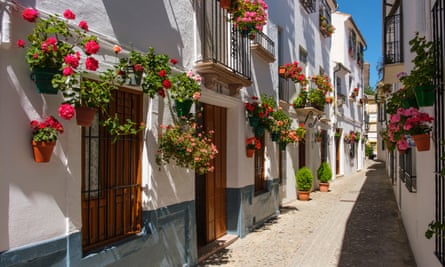 Typical street with flowers in Barrio de la Villa, Priego de Cordoba. Cordoba province