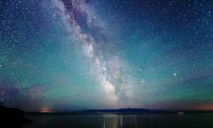 Milky Way Night Sky with Air Glow Light<br>The milky way over Lake Superior with air glow and aurora borealis luminescence.