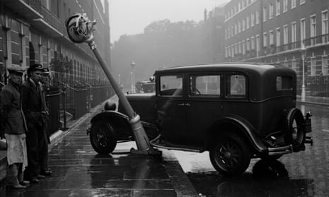 A motor car which has crashed into a lamppost, 1930. 