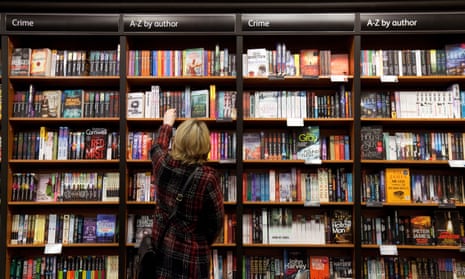 A woman browses the shelves in a bookshop