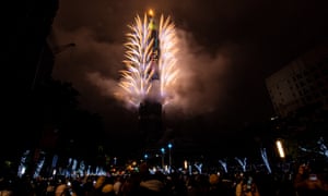 Fireworks light up the Taipei skyline as Taiwan rings in 2022.