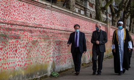 From left: Rabbi Daniel Epstein, the archbishop of Canterbury, Justin Welby, and Imam Kareem Farai visiting the wall in April.