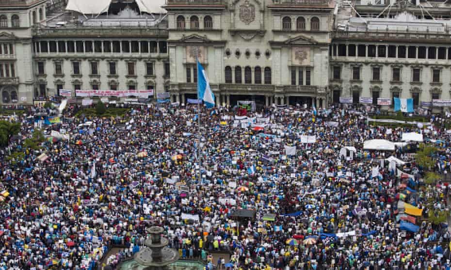 Protesters gather outside the National Palace.