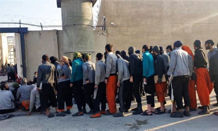 IS members are rounded up in Ghwayran prison in Hassakeh, northeastern Syria.