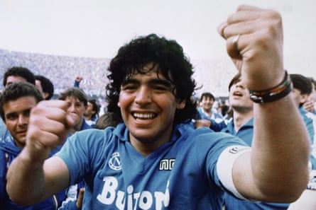 Maradona celebrates after winning the title with Napoli.