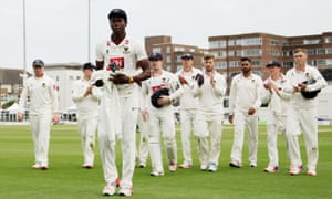 Jofra Archer is applauded by his Sussex teammates after taking four wickets on his first-class debut in 2016.