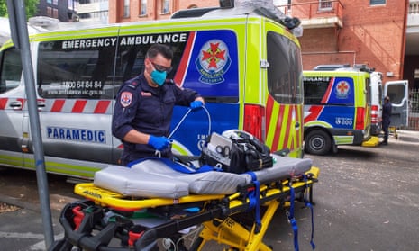 A file image shows a paramedic moving equipment