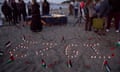 Ayşenur Ezgi Eygi's name spelled out in lit candles