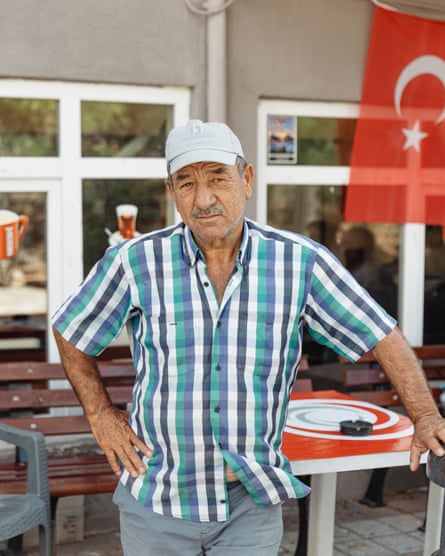 Kemalettin Özenç outside a cafe.