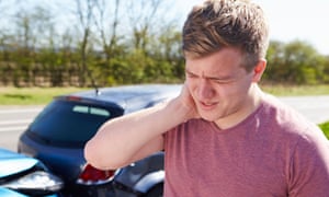 A man with a sore neck after a car bump