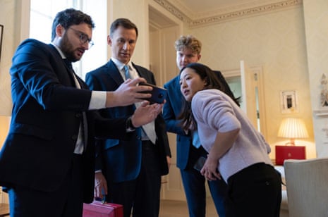 Jeremy Hunt with aides ahead of his budget speech