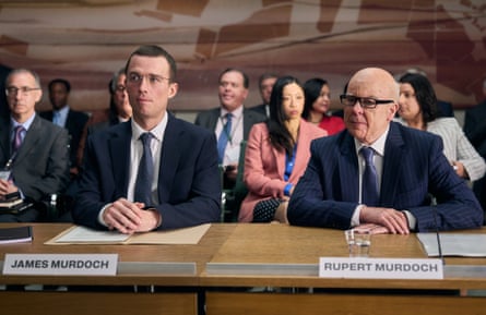 Two men seated at a desk