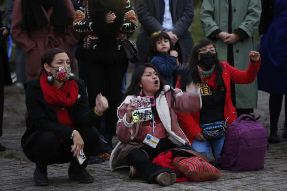 Activists hold a memorial at Cop26 for the 1,005 environmental defenders murdered since the Paris agreement.