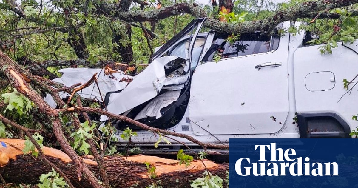 ‘Don’t die, I will be back’: Oklahoma boy saves parents after tornado tosses truck – The Guardian US