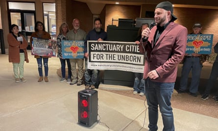 Anti-abortion activist Mark Lee Dickson speaks to fellow activists ahead of a city commission meeting in Hobbs, New Mexico, in November 2022.
