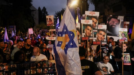 Israelis gather near Netanyahu's residence as they mark anniversary of October 7 attacks – video