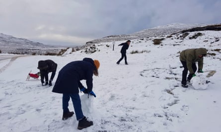 playing in the snow, Isle of Skye, Scotland