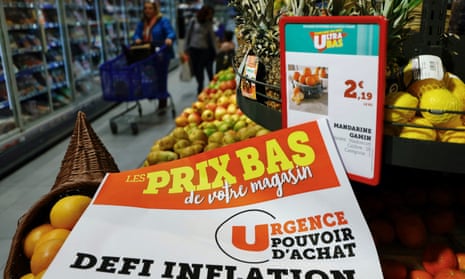 A sign reads: ‘Emergency purchasing power, inflation challenge’ in the fruit section of a supermarket in Nice in March.