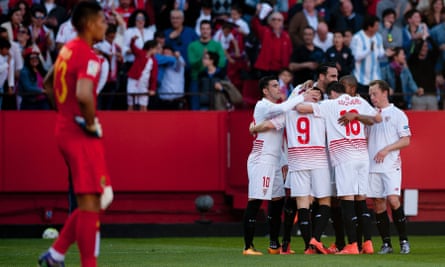 José Antonio Reyes celebrates with team-mates after scoring Sevilla’s fourth goal in the game of the season, against Villarreal.