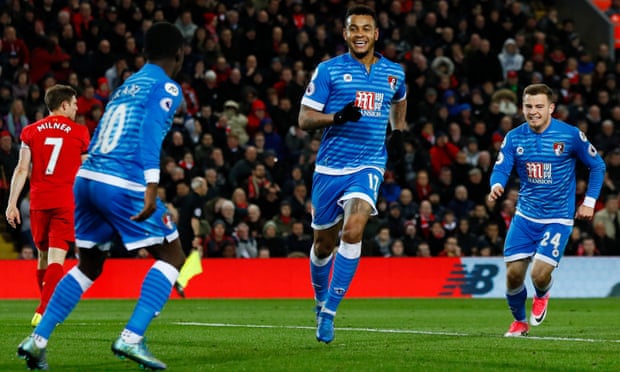 Joshua King, centre, celebrates scoring Bournemouth’s late equaliser at Anfield to deny Liverpool victory.