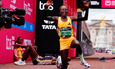 Peres Jepchirchir reacts after finishing first in the elite women’s race and breaks the women’s-only world record
