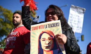US-POLITICS-HOLIDAY-MLK-TEACHER-STRIKE<br>Striking public school teachers and their supporters march during the 34th annual Kingdom Day Parade on Martin Luther King Jr Day, January 21, 2019, in Los Angeles, California. (Photo by Robyn Beck / AFP)ROBYN BECK/AFP/Getty Images