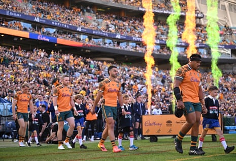 Wallabies players enter the field for the Bledisloe Cup Test against the All Blacks at Accor Stadium