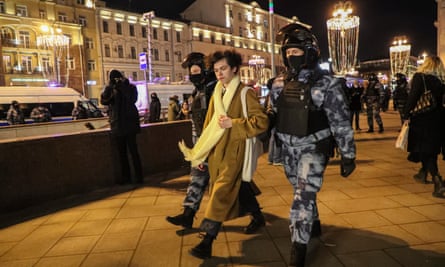 Russian police detain a protester in Moscow on Friday during a rally against the invasion of Ukraine.