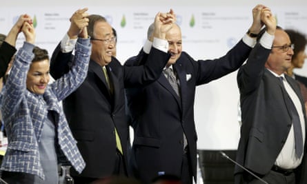 Christiana Figueres, left, UN secretary-general Ban Ki-moon, French foreign secretary Laurent Fabius and French president Francois Hollande celebrate at the Paris UN climate conference in 2015.