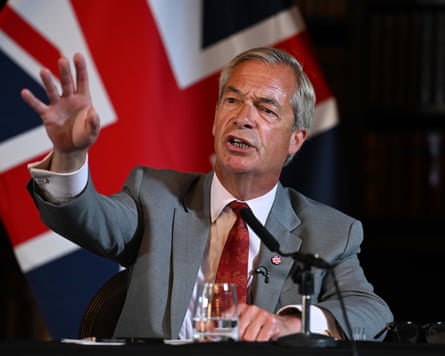 Reform UK leader Nigel Farage speaks during a press conference sitting at a podium in front of a union flag.