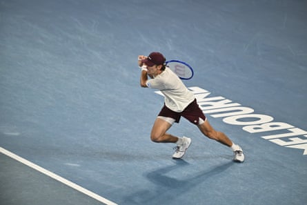 Alex de Minaur plays a shot
