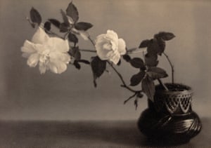 Taizo Kato, Bowl with Two White Roses, circa 1920The soft focus, warm tonality, and choice of subject matter all make this photograph by Taizo Kato a classic example of Pictorialism, the movement which most defined fine art photography in the early 20th century. Photographers associated with the movement emphasised photography’s expressive potential over its documentary function, often by consciously adopting the look of painting.