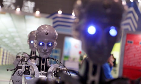 Robots on display during the 17th China International Industry Fair in Shanghai