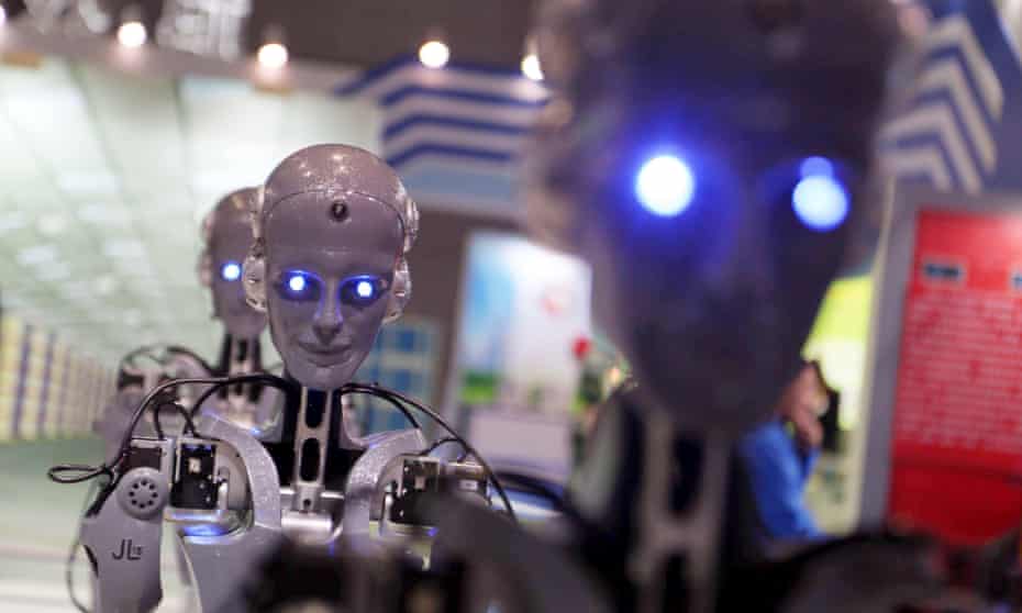 Robots manufactured by Shaanxi Jiuli Robot Manufacturing Co on display at a technology fair in Shanghai