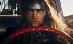 woman with paint on her forehead driving a truck