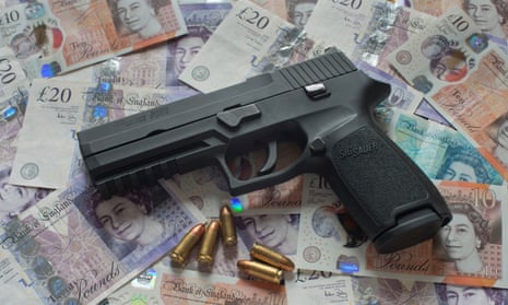 Sig Sauer P25 pistol and 9mm.ammunition with dollar bills and with British pound notes