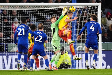 Watford’s Mattie Pollock climbs highest to score his side’s second goal of the game at Leicester
