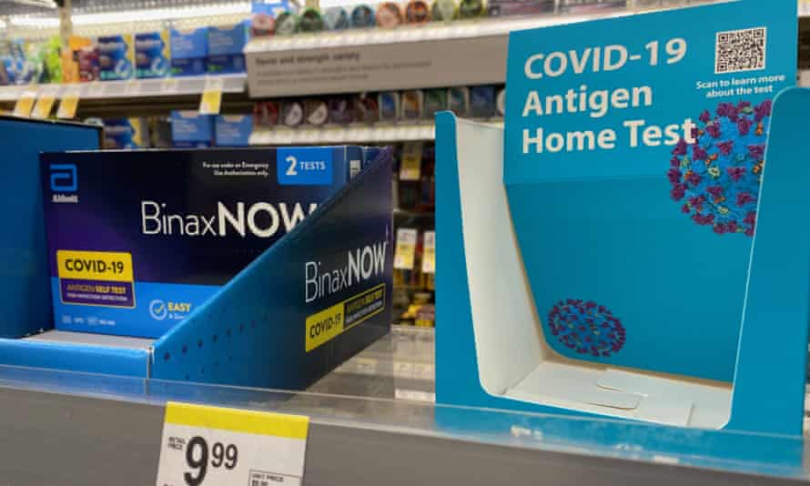 A dwindling supply of Covid at-home tests are seen on a shelf in Racine, Wisconsin, on 19 December.