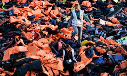 Testament to suffering … a mountain of lifejackets left behind by refugees and migrants crossing the Aegean sea from Turkey to the Greek island of Lesbos in 2015.