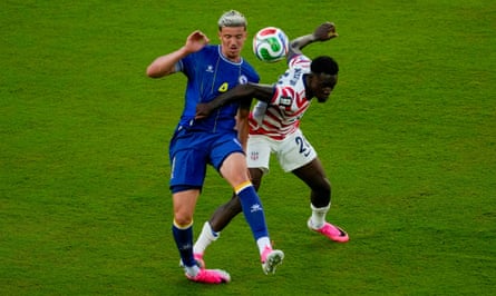 Tarik Muharemovic is trodden on by Folarin Balogun, leading to the US striker’s red card against Bosnia and Herzegovina.