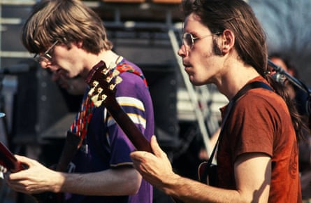 Phil Lesh, left, and Bob Weir as the Grateful Dead perform at the Sound Storm rock festival 1970 in Wisconsin.