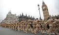 Soldiers from the British 7th Armoured Brigade who have returned from service on operations in Iraq march past Big Ben in London, 23 February 2009. 