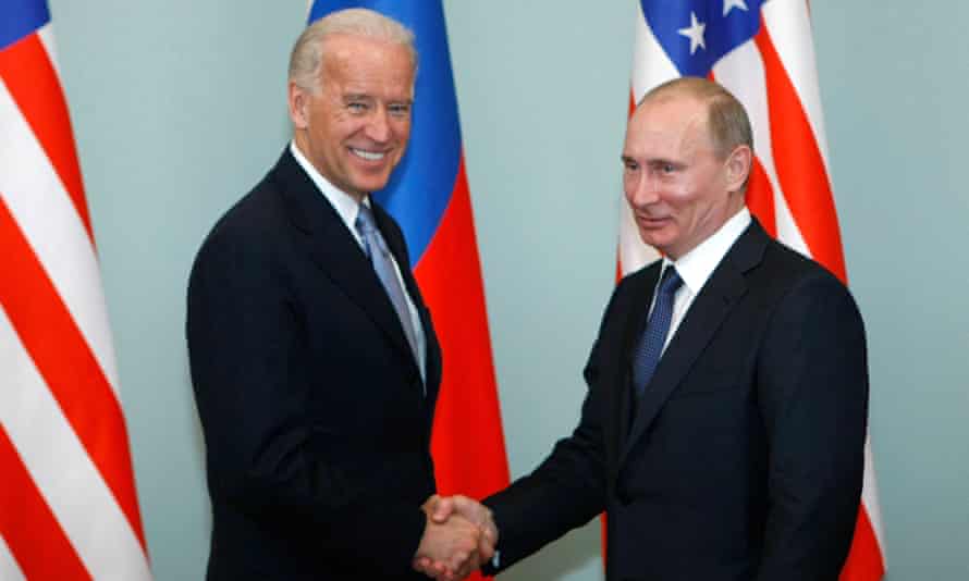 Biden warns that Putin will pay a price for interfering in 2020 US election  | Joe Biden | The Guardian