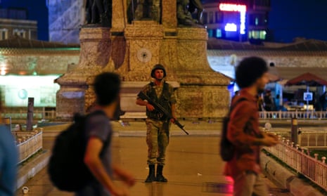 A Turkish military stands guard in the Taksim Square in Istanbul.