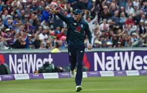 Overton celebrates taking the catch after Roy threw the ball to him to remove Marsh.